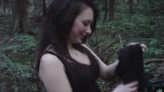 Naughty brunette Kitten worships her boyfriend's prick in the outdoors